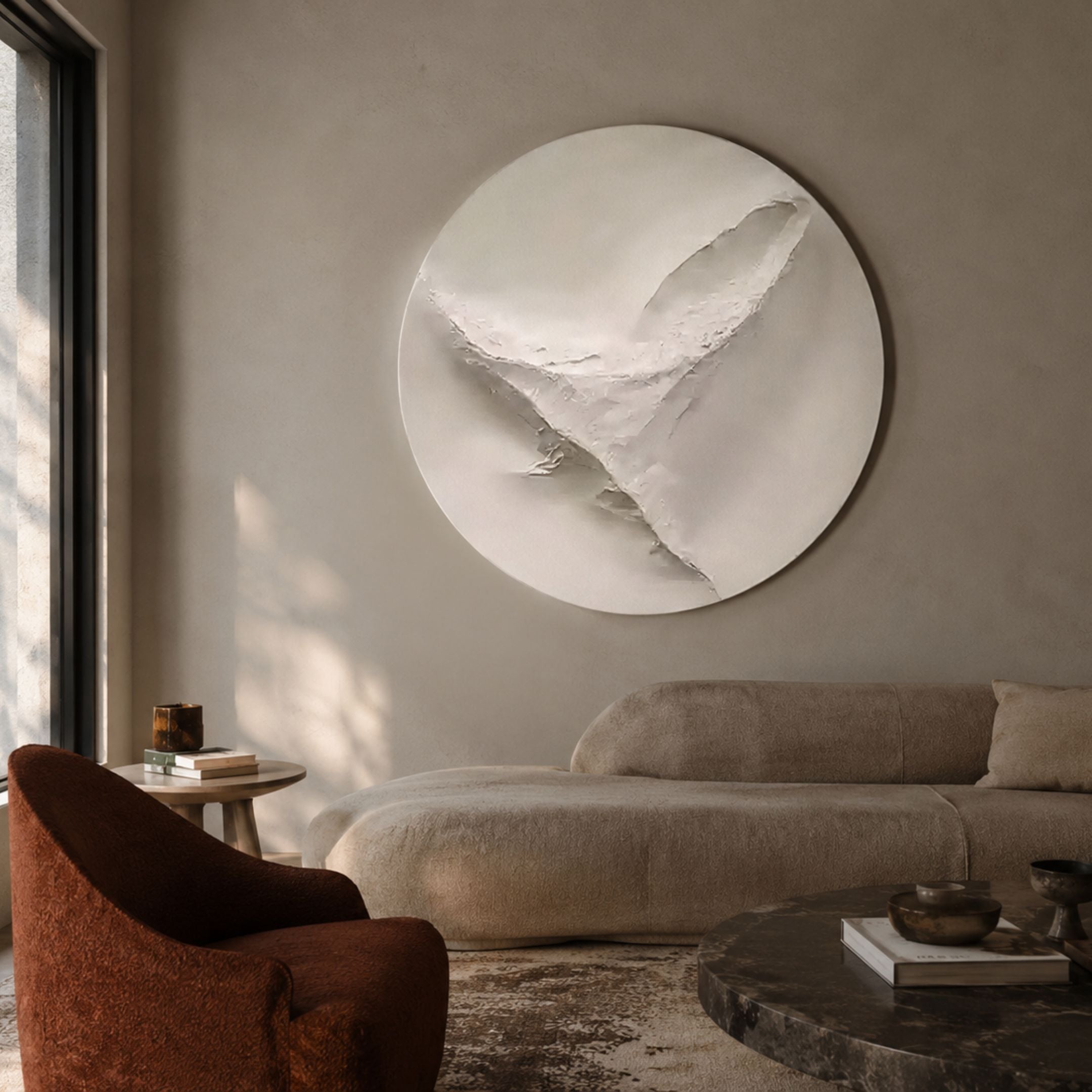 Selene III White Sandstone Textured 3D Wood Relief Wall Art mounted above a beige curved sofa with a rust armchair and dark round coffee table.