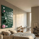 Orbison Green 3D Wood Relief Wall Art with pink, white, and dark green metal balls, mounted above a linen bed in a warm neutral bedroom.