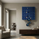 Orbina Blue 3D Wood Relief Wall Art With Metal Ball by Giant Sculptures displayed above a walnut sideboard in a neutral living room with linen armchair.
