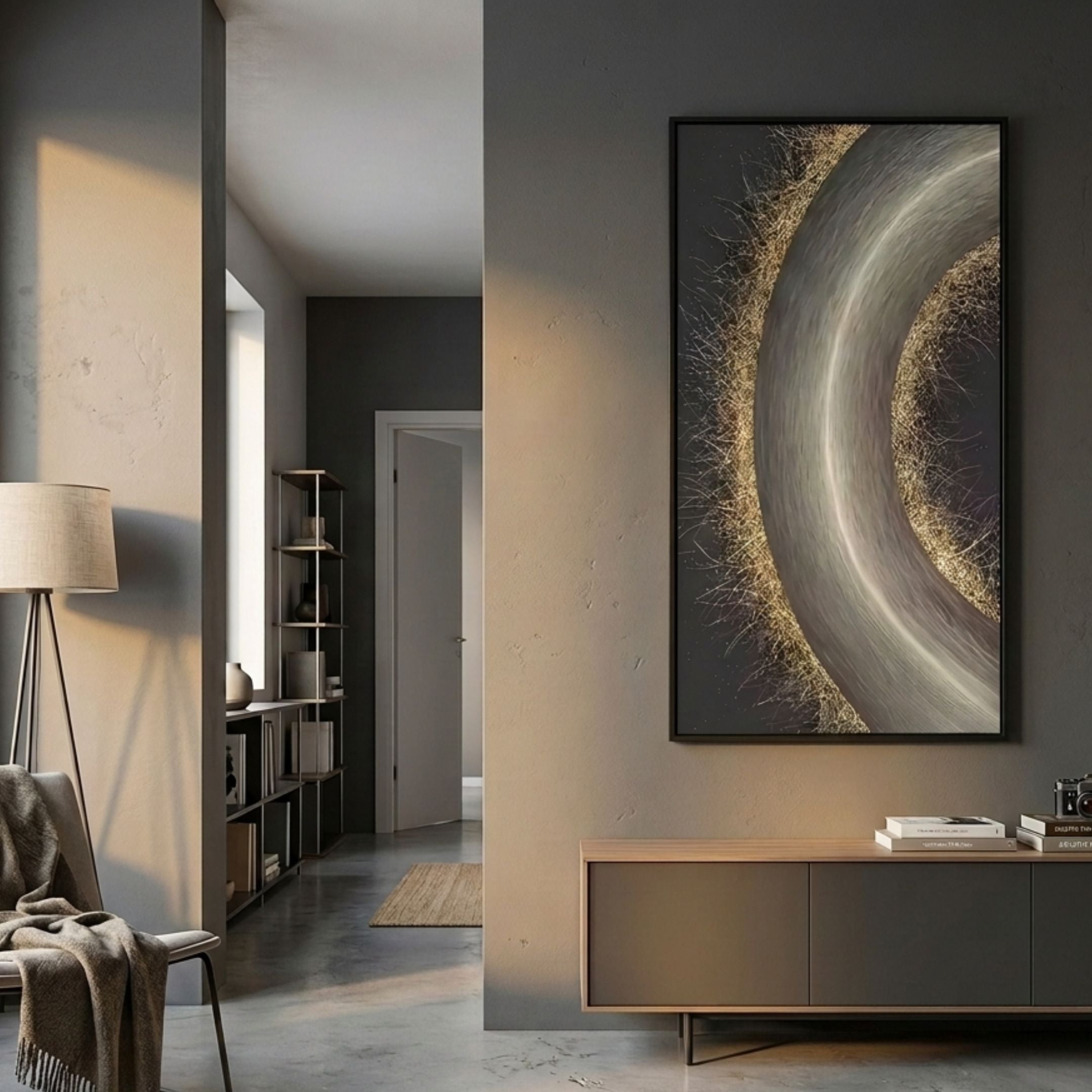 Celeste Orbit Glow LED Wall Art by Giant Sculptures displayed on a grey wall above a wooden sideboard in a modern living space with floor lamp and chair.