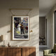 Aristo Royal Wedding Painting Gold Frame Hanging Wall Art by Giant Sculptures displayed above a walnut sideboard with lamp and vase in a sunlit living room.