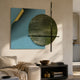 Tesselle Blue Metal Fold & Green Textured Geometric Wall Art by Giant Sculptures mounted above a dark console in a neutral living room.