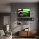 Visario Rolex Inspired Luxury Metal Wall Art by Giant Sculptures, a three-panel collage in black, gold, and green displayed above a walnut sideboard in a modern living room.