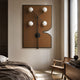 Axial Elegance Bronze Symmetrical Metal Wall Art by Giant Sculptures mounted above a bed, with four white globe bulbs on an X-shaped rod over a brown panel.