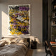 Scriptura II Multicolour Graffiti Expression Metal Wall Art by Giant Sculptures displayed above a linen-dressed bed in a sunlit modern bedroom.