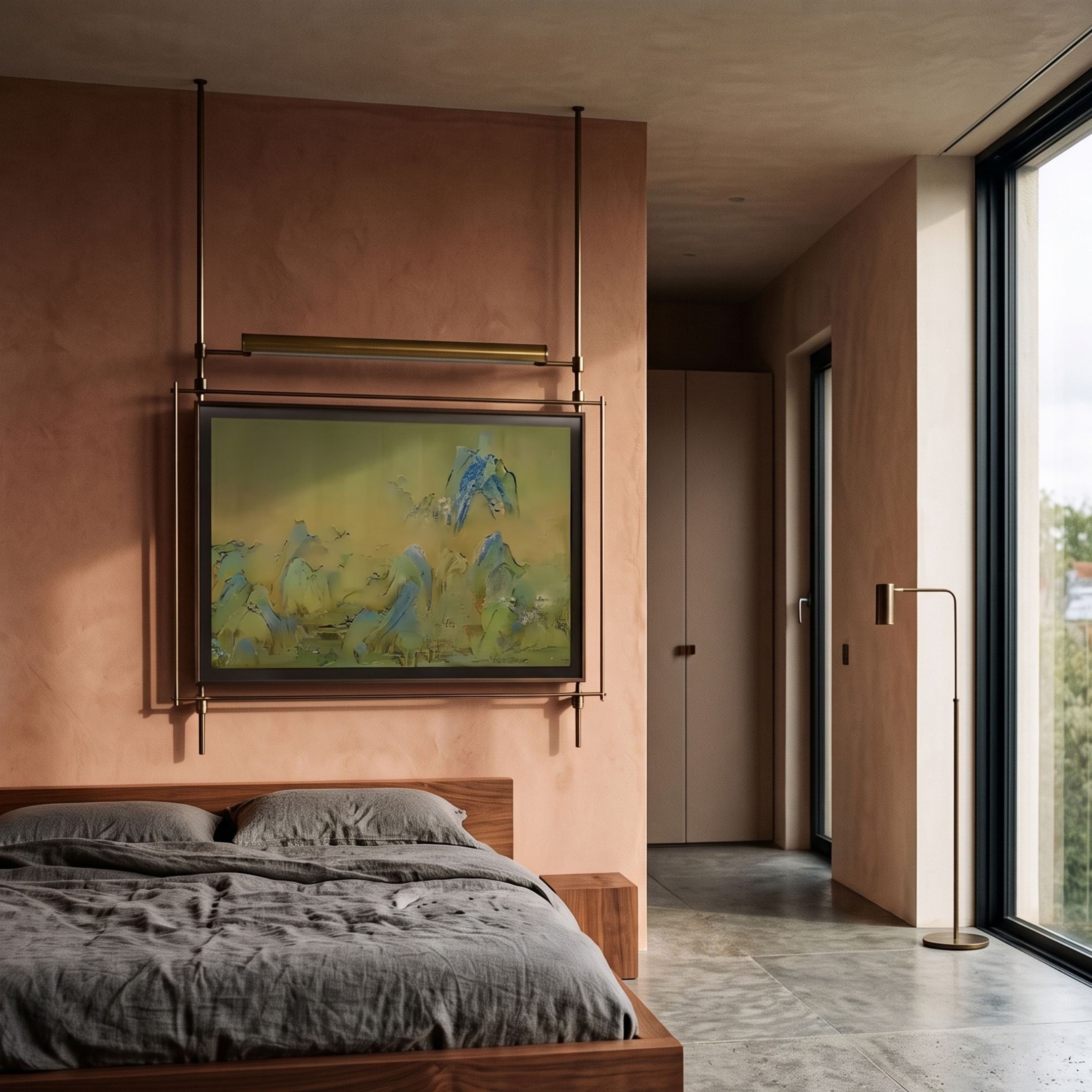 Celestique Misty Horizons Framed Long Hanging LED Wall Art by Giant Sculptures, suspended on a brass frame above a wooden bed in a terracotta-walled bedroom.