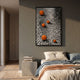 Luminosa Orange Orb Textured Metal 3D Wall Art by Giant Sculptures mounted above a bed with linen bedding, concrete nightstand, and grey plaster wall.