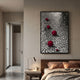 Luminosa Red Orb Textured Metal 3D Wall Art by Giant Sculptures displayed above a walnut bed with a desk lamp and mug on the nightstand in a modern bedroom.
