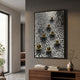 Luminosa Gold Orb Textured Metal 3D Wall Art by Giant Sculptures displayed on a taupe wall above a walnut console with books and a ceramic vase.