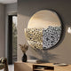 Aurelio Bottom-Right Metallic Layered Textured Round Wall Art by Giant Sculptures, with perforated gold and textured silver over beige, above an oak console.