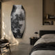 Echo Nature-Inspired Abstract Panel Metal Etched 3D Wall Art by Giant Sculptures, an elongated monochrome tree landscape panel mounted in a sunlit bedroom above concrete flooring.