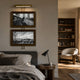 Artisera Venetian Promenade Classic Dual Frame Built-In Light Wall Art displayed above a bed, with bronze frames, black-and-white Venice scenes, and warm picture light.