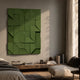Prisma Green Geometric Panel 3D Wall Art by Giant Sculptures mounted above a wooden bench with stacked books in a sunlit bedroom with neutral decor.