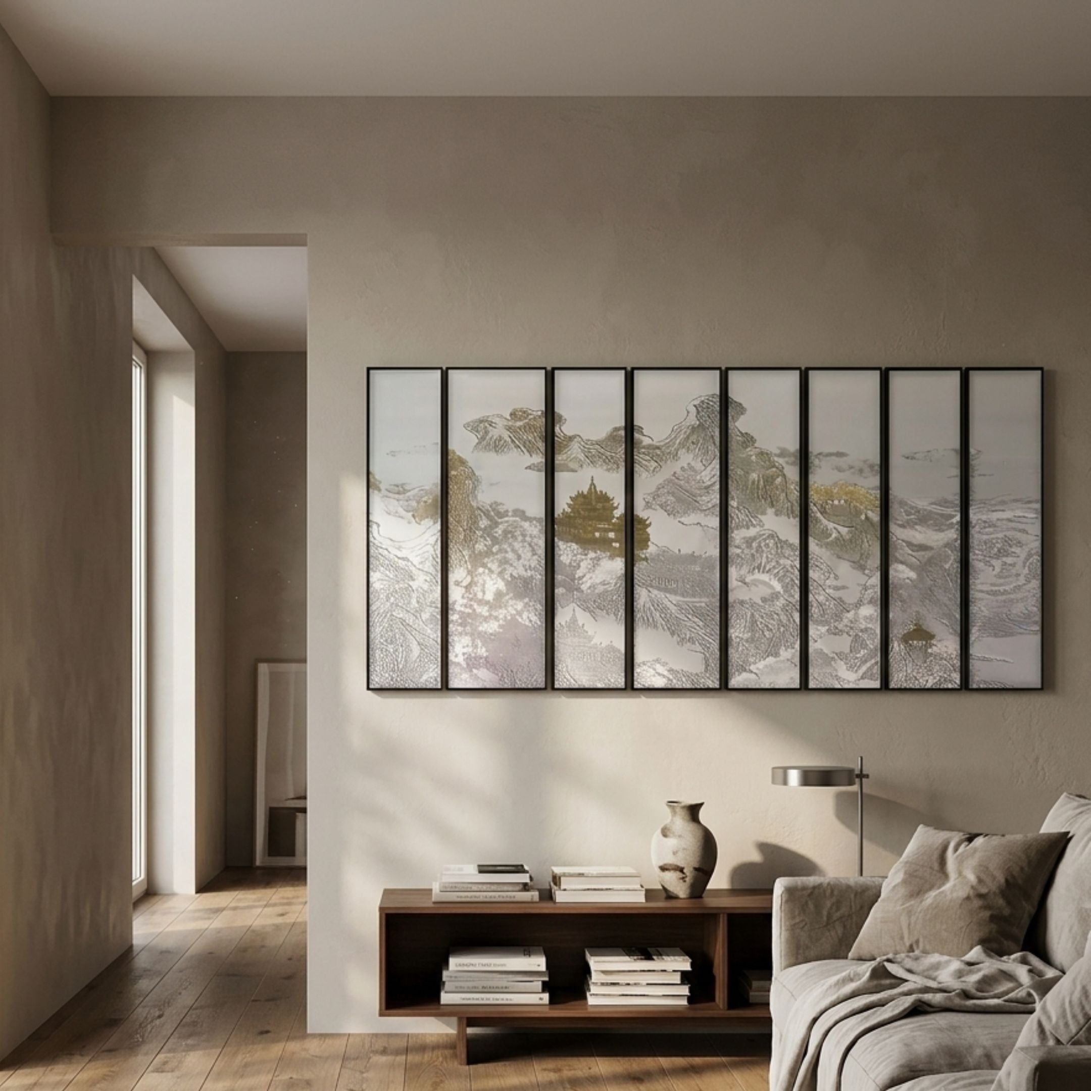 Silvienne Multi-Panel Silk Wall Art by Giant Sculptures, eight-panel mountain landscape with gold foil highlights mounted above a wooden console in a neutral living room.