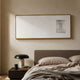 Lustreline White Right Plaster Statue Cardboard Wall Art by Giant Sculptures mounted above an upholstered bed with a dark nightstand and dome lamp.