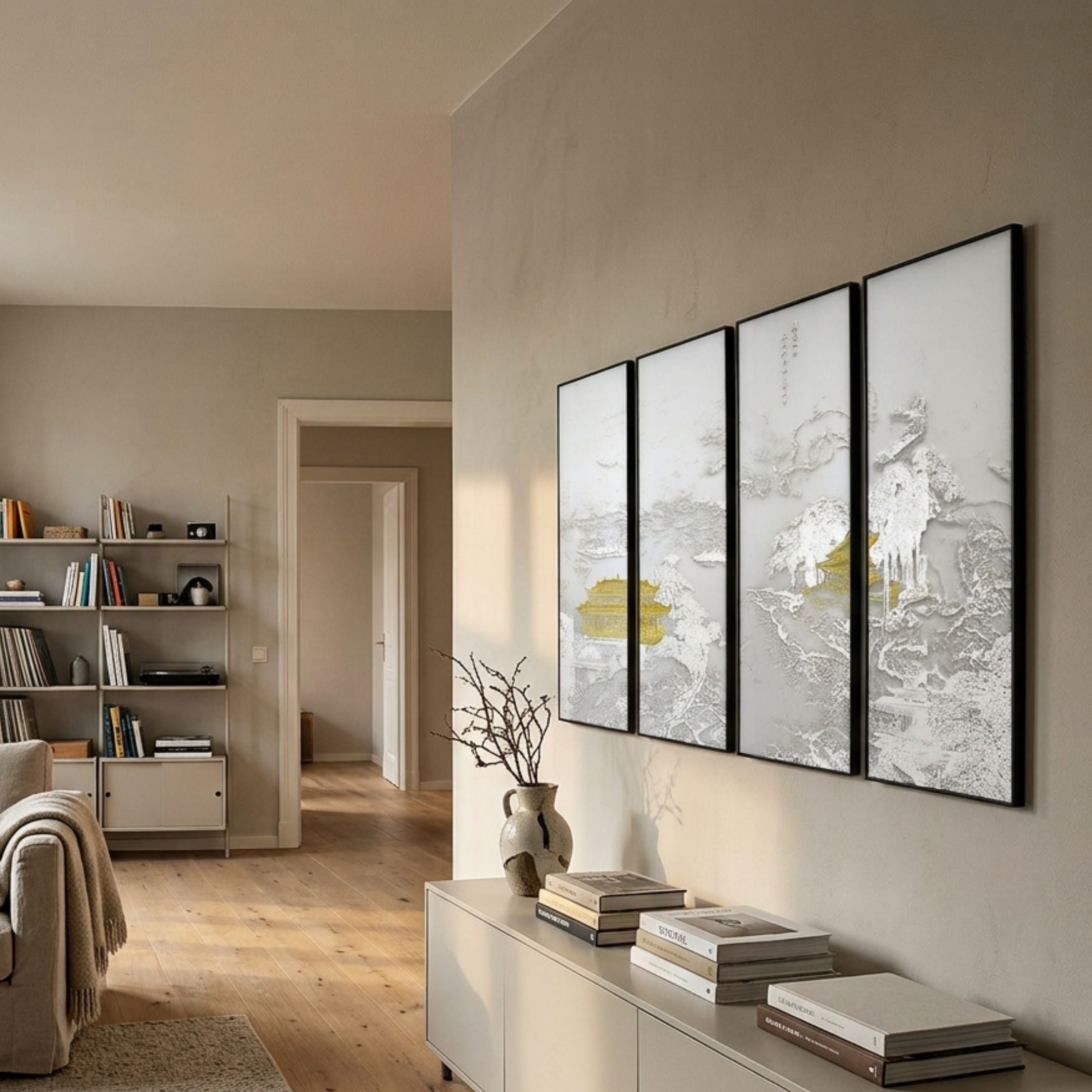 Velantra Intricate Multi-Panel Silk Artwork by Giant Sculptures, four vertical panels with white, silver, and gold pagoda landscape, mounted in a neutral living room.