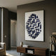 Elysian 3D Ceramic Wall Art with vertical blue geometric design by Giant Sculptures, displayed above a walnut console in a modern grey-walled living room.