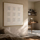 Lustella White Plaster Statue Square Cardboard Wall Art by Giant Sculptures in a gold frame above a bed, beside a wooden desk and bookshelves.