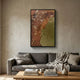 Astrid Rustic Glow Metallic Abstract Wall Art by Giant Sculptures, framed in black above a grey sofa with linen throw in a warm neutral living room.