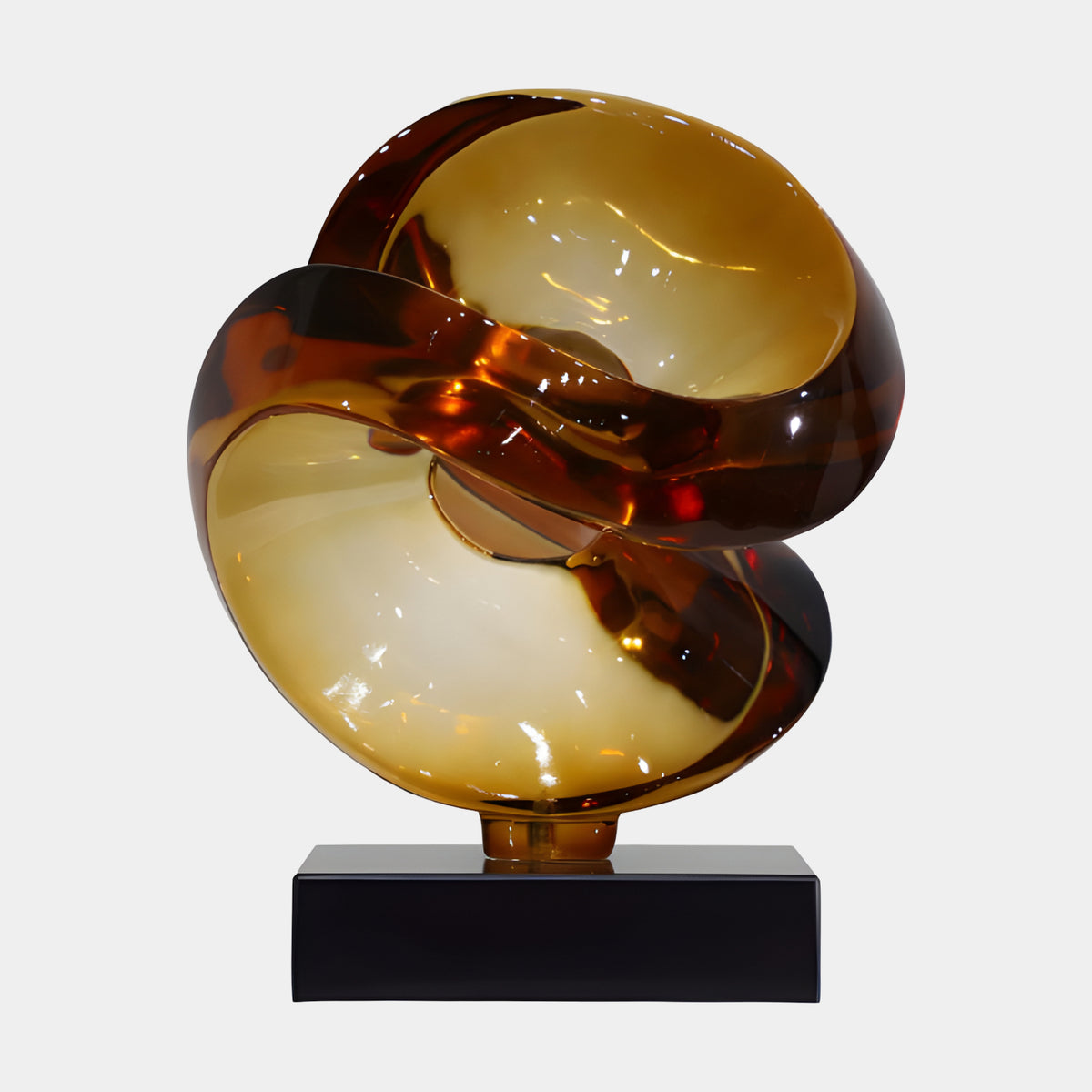 Amber Cut Sphere on Black Marble Resin Sculpture, 46cm, with swirling cream-lined hollows on a black marble base, shown on a plain white background.