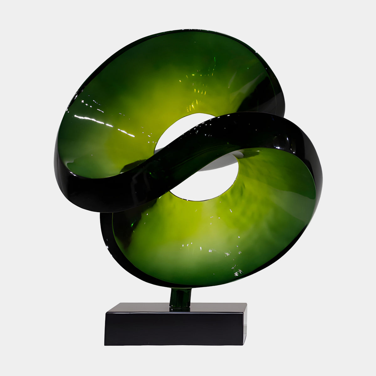 Green Double Scoop Cut Sphere on Black Marble Resin Sculpture - 56cm, dark green exterior opening to glossy lime-green hollows, on a black marble base, plain white background.