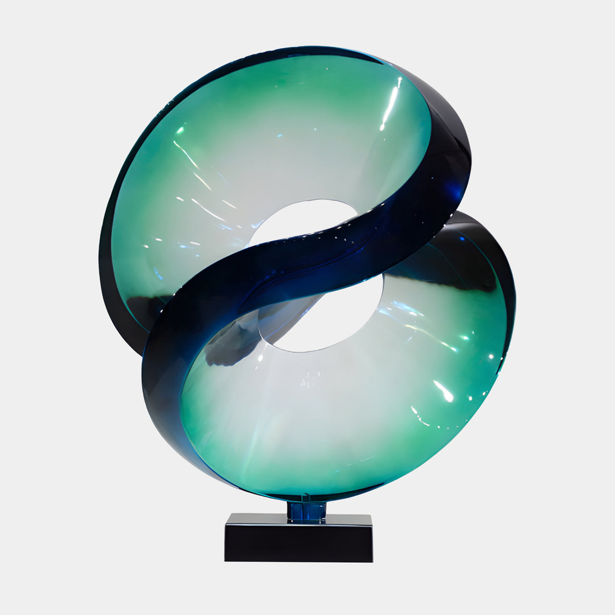 Teal Cut Sphere on Black Marble Resin Sculpture, 88cm, with intertwined scoop forms shifting from deep blue to green, set on a black marble base against a plain white background.