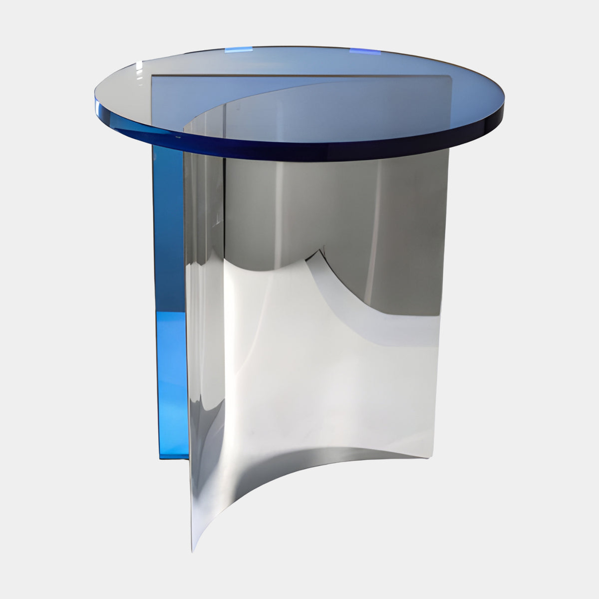 Blue Acrylic Side Table on Mirror Steel Curve, 50cm, with a round blue top over a curved mirror-polished steel base and blue acrylic panel, on a plain white background.