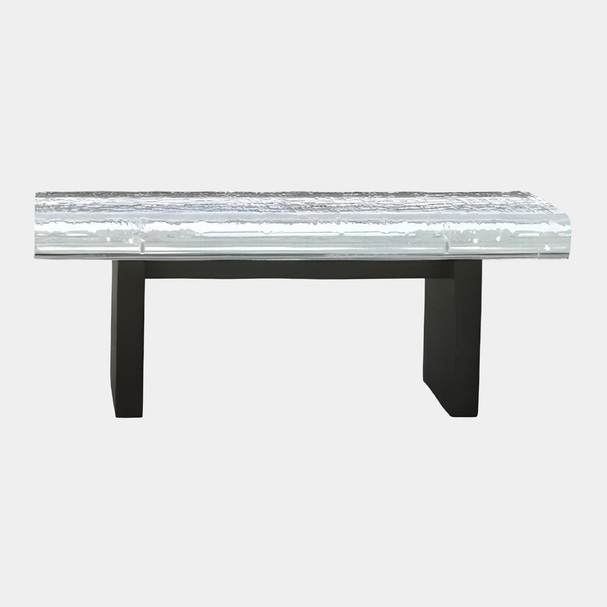 Clear Rippled Slab Acrylic Bench on Dark Trestle, 115cm, with textured horizontal ripple top on a black metal base, shown on a plain white background.