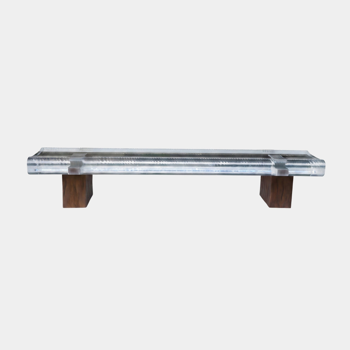 Clear Resin Slab Bench on Brown Timber Blocks, 250cm, rippled clear resin seat on two solid wood blocks, shown against a plain light background.