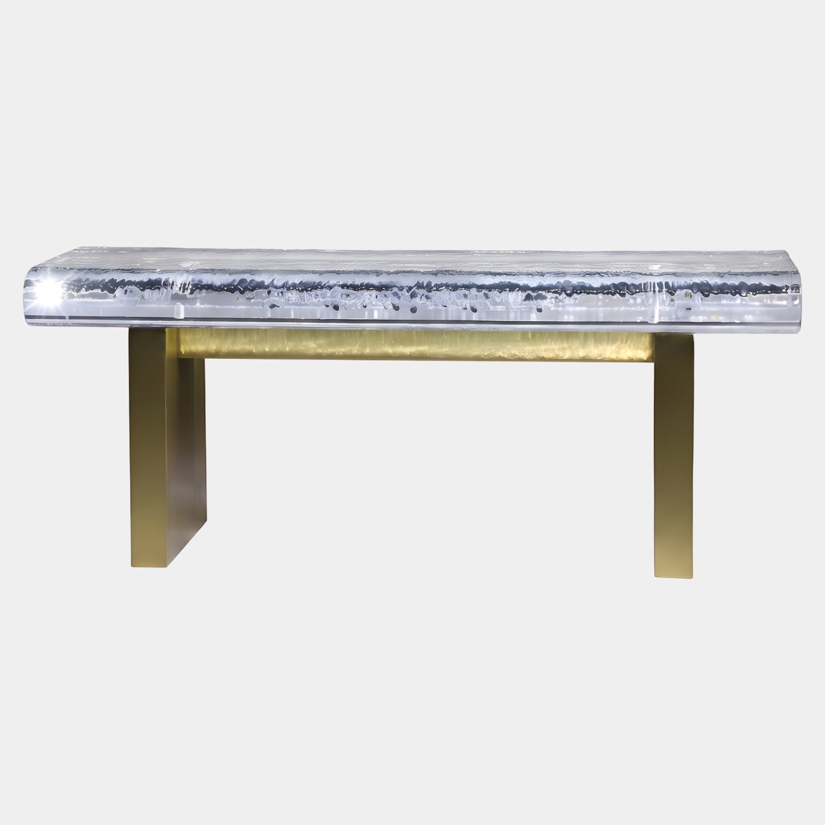 Clear Grained Panel Bench on a Brass Trestle (100cm) with a textured acrylic seat and brass legs, shown against a plain white background.