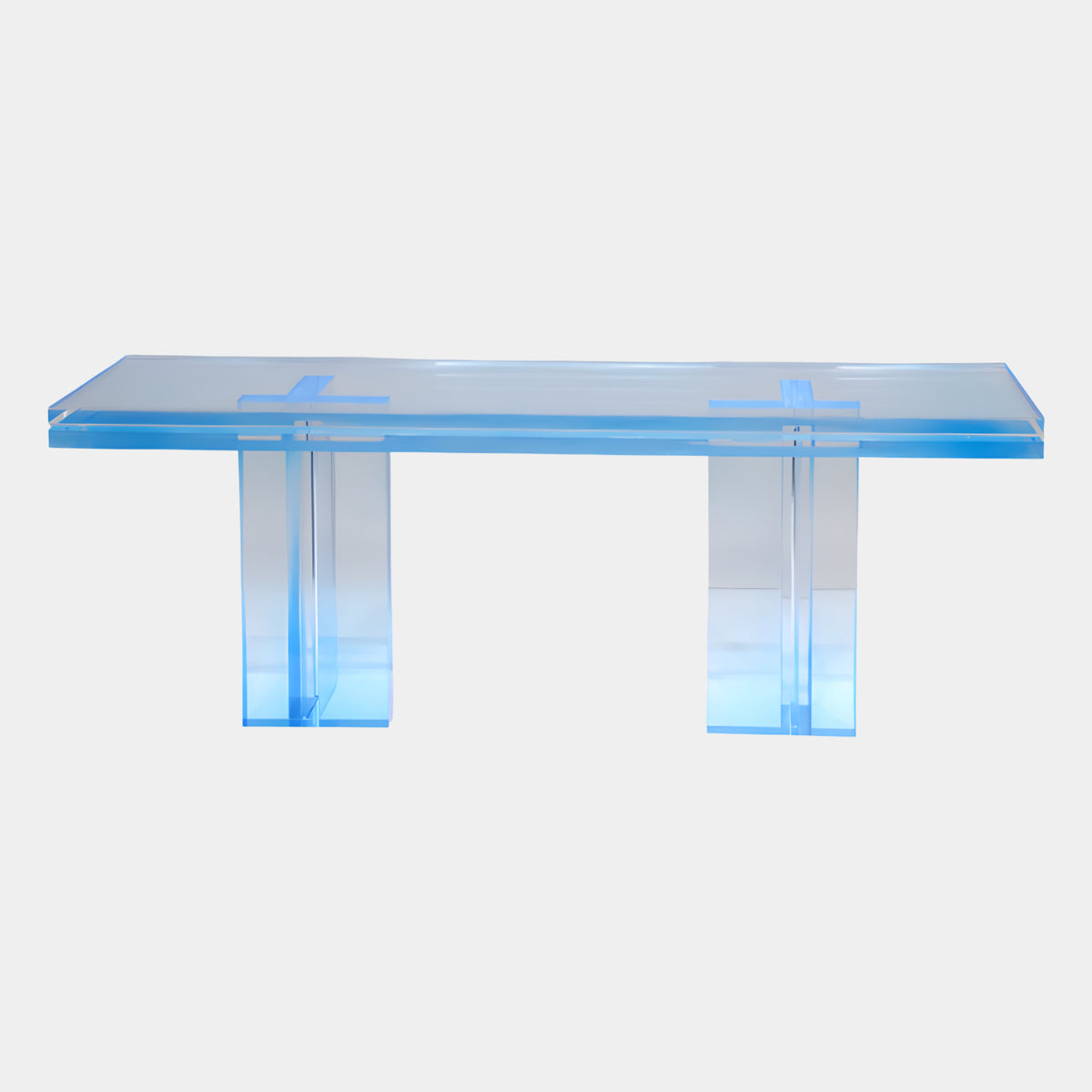 Blue Graded Cross-Lapped Panel Acrylic Bench, 120cm, by Giant Sculptures, with a clear slab top and two cross-lap panel supports, set against a plain white background.