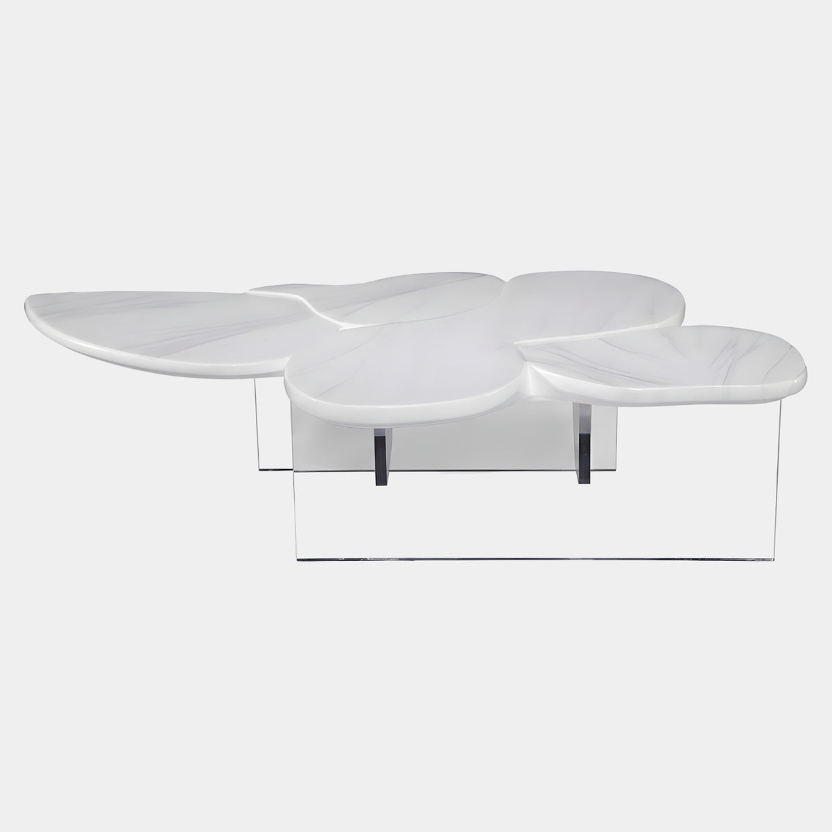 White Petal Pad Low Table, 127cm, with four overlapping white petal-shaped surfaces at varying heights on clear acrylic panel legs, shown against a plain white background.