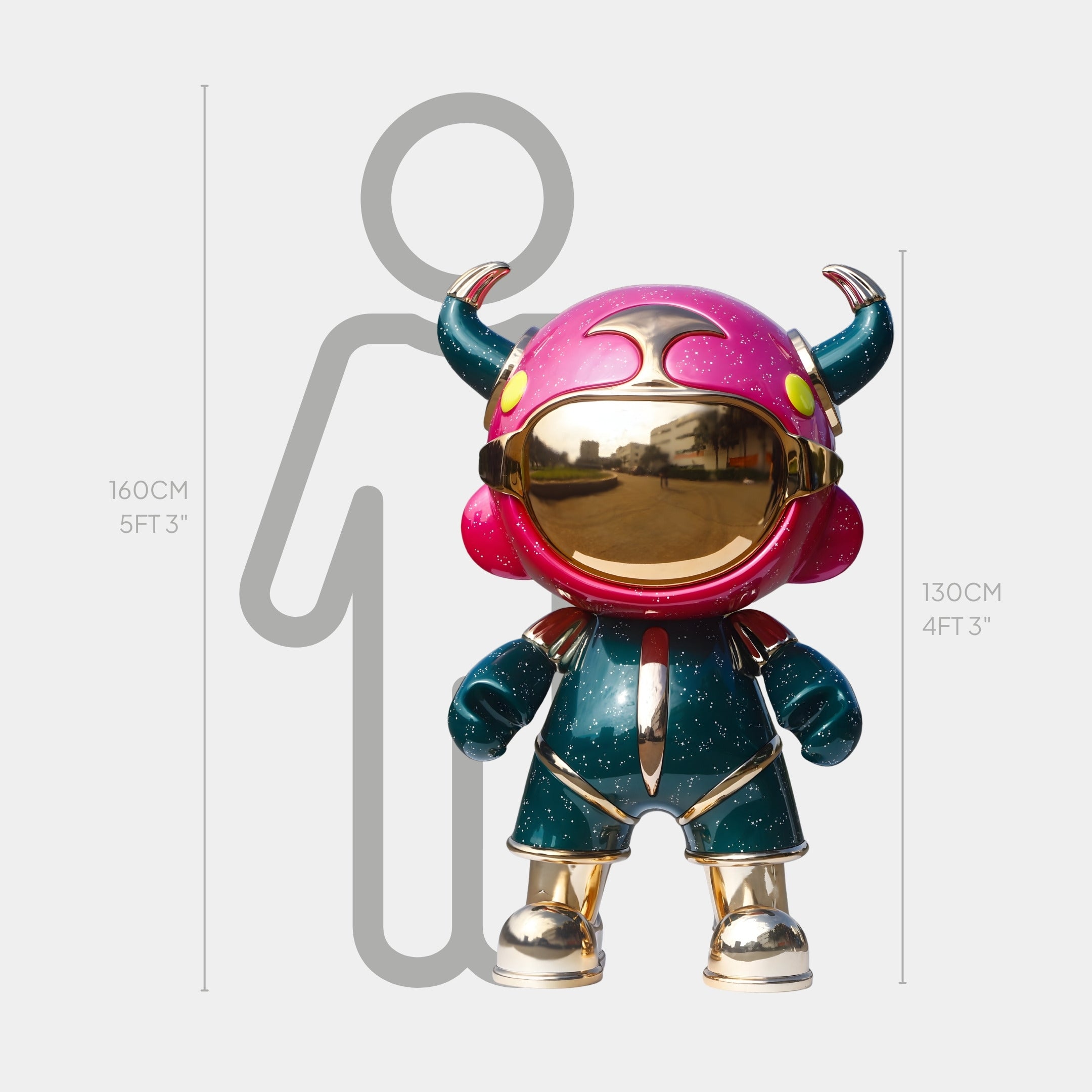 The Pink & Teal Suit Astro Devil Sculpture by Giant Sculptures stands 130cm tall, featuring a gold visor, horned helmet, and galaxy-patterned suit in pop-art style beside a 160cm human outline.