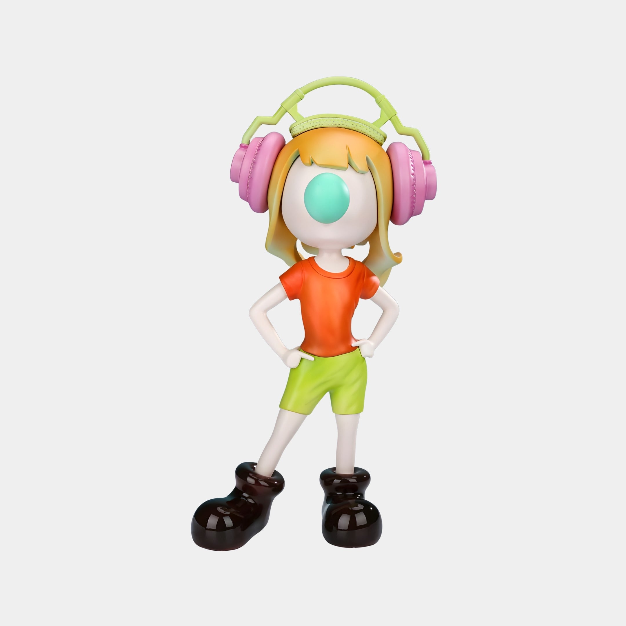 A cartoon figure with an orange shirt, green shorts, black shoes, and pink headphones stands hands on hips, echoing the designer-toy vibe of Giant Sculptures’ Neon Coral Vibella Headphone Figure - 60cm.