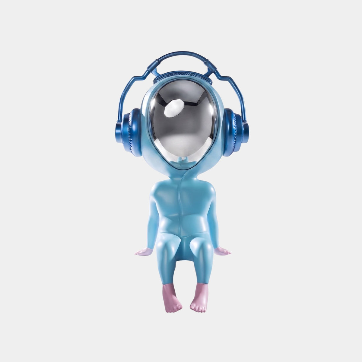The Sky Blue Alien Beats Figure - 55cm by Giant Sculptures features a stylized alien with pink hands and feet, large headphones, and a reflective face—an eye-catching modern sculpture set against a white background.