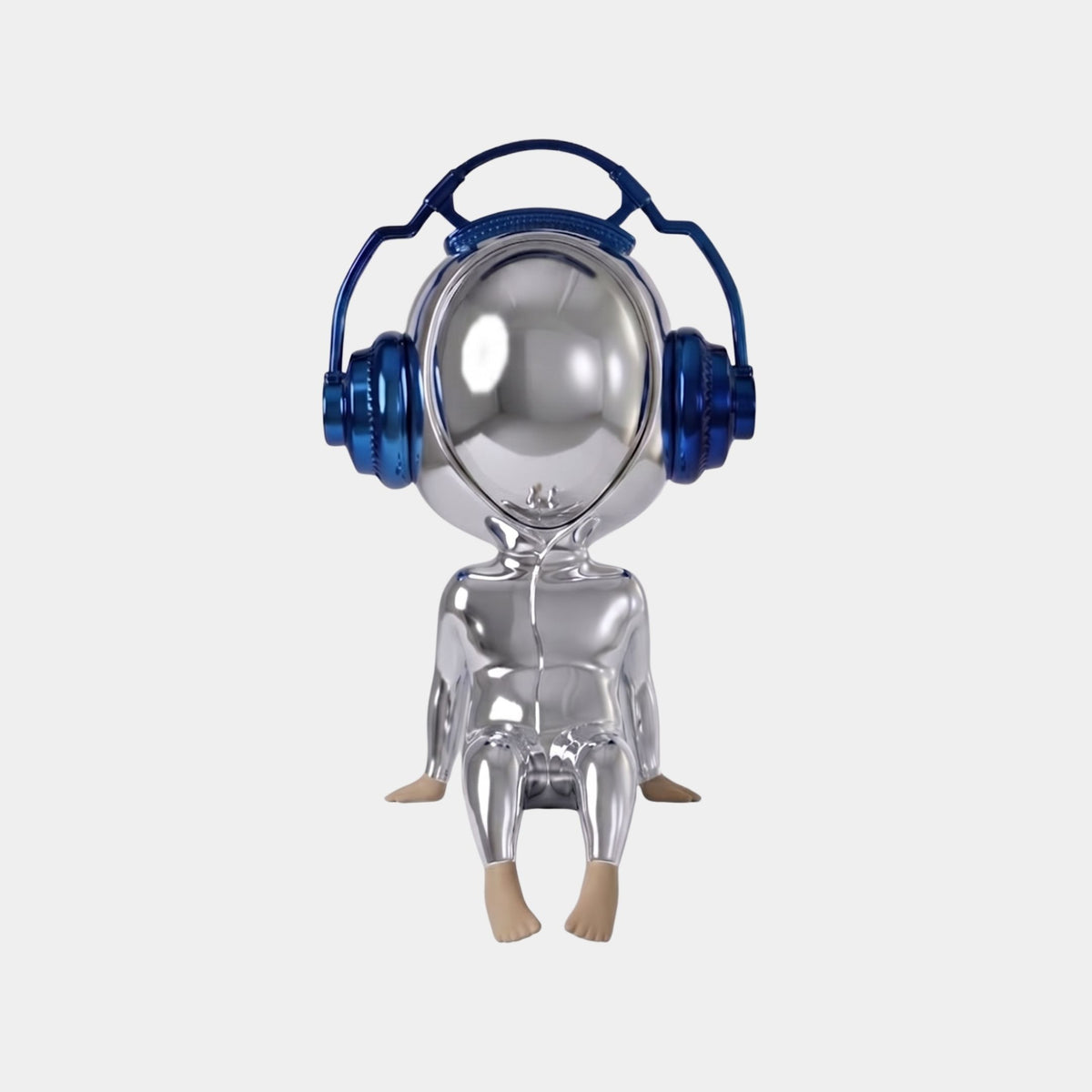 Midnight Chrome Alien Beats Figure, 55cm, seated pop art sculpture with liquid chrome finish, oversized cobalt-blue headphones, and flesh-toned hands and feet, shown on a plain white background.