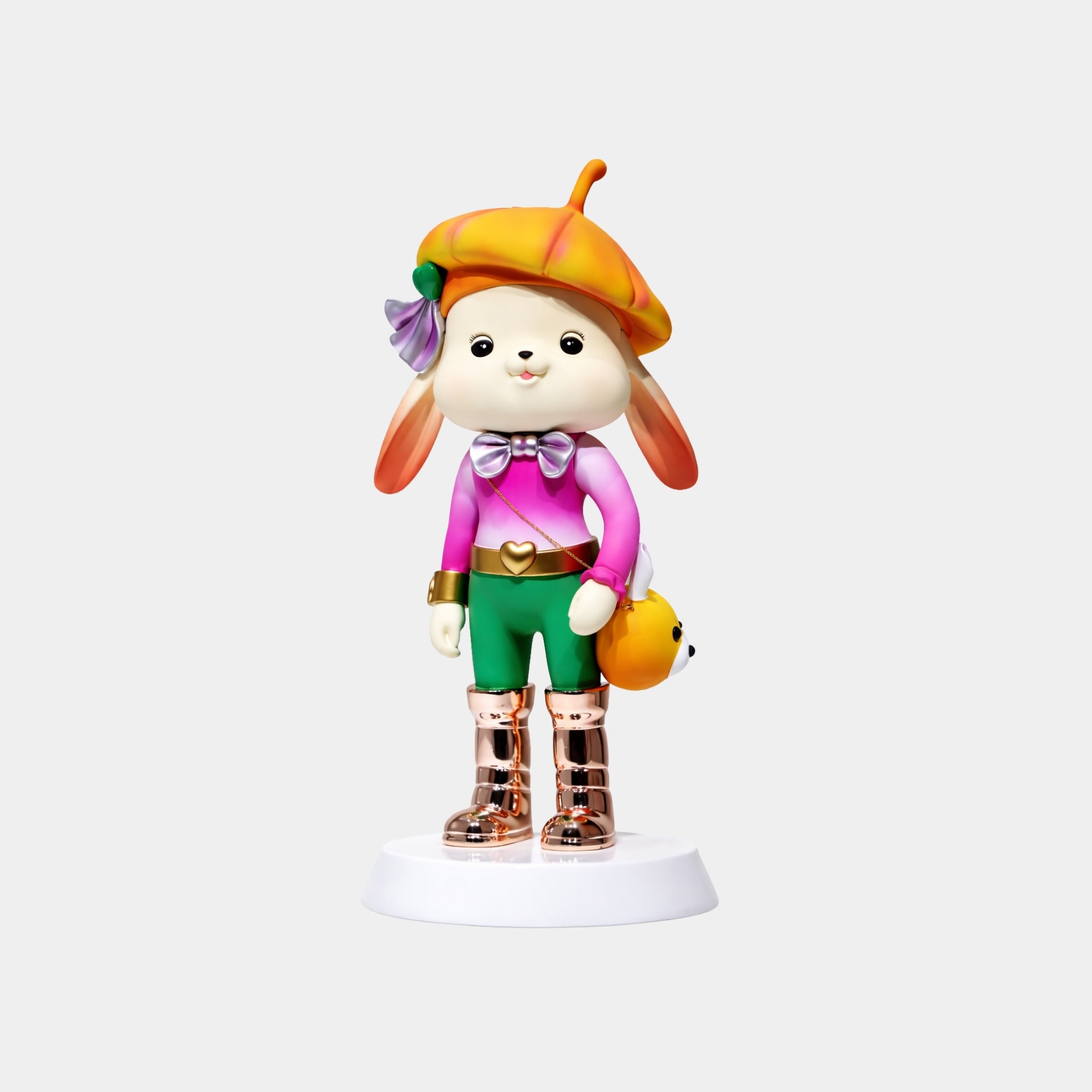 The Pastel Bloom Bunny Figure by Giant Sculptures stands 58cm tall, dressed in a yellow beret with flower, purple bow tie, pink top, green shorts, metallic boots, and holding an orange bag—ideal as a designer art toy.