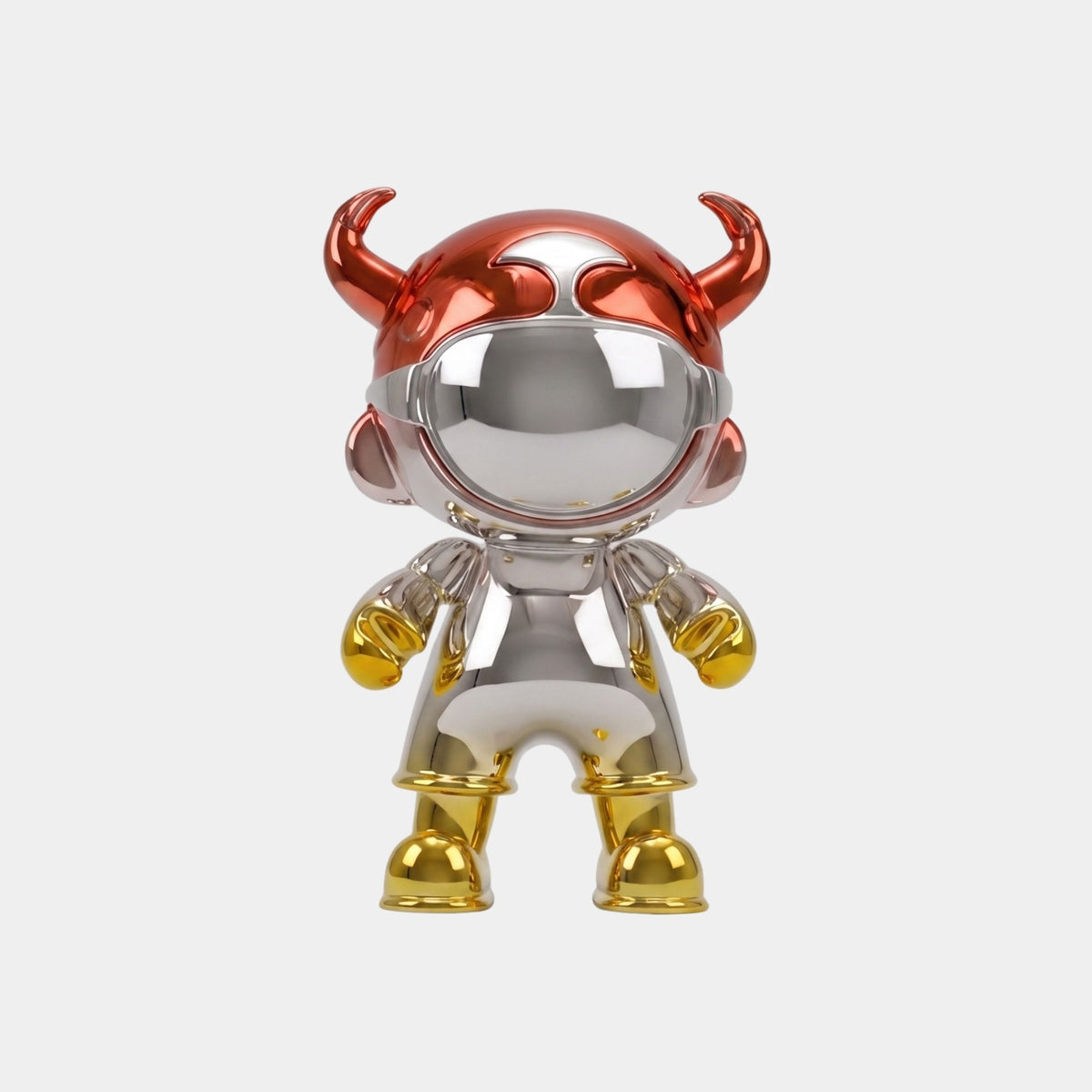 The Crimson & Gold Electroplated Astro Devil Figure - 35cm by Giant Sculptures features a shiny, reflective finish, red horned helmet, silver body, and gold hands and feet, standing upright like collectible art against a white background.