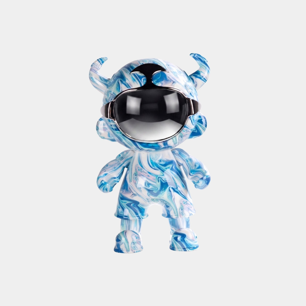 The Glacier Swirl Astro Devil Figure - 35cm by Giant Sculptures features blue and white marbling, small horns, and a mirrored faceplate reflecting a person and curved interior, set against a plain light gray background.
