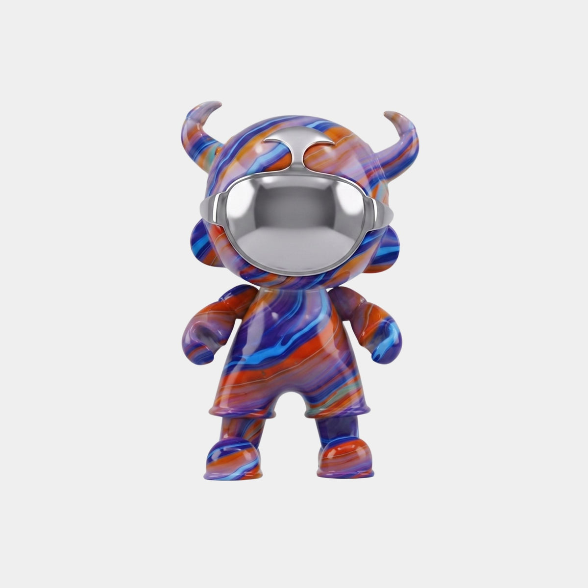 The Midnight Flow Astro Devil Figure by Giant Sculptures stands 35cm tall, featuring horn-like details, a shiny silver visor, and swirling blue, purple, and orange patterns—displayed against a plain white background.