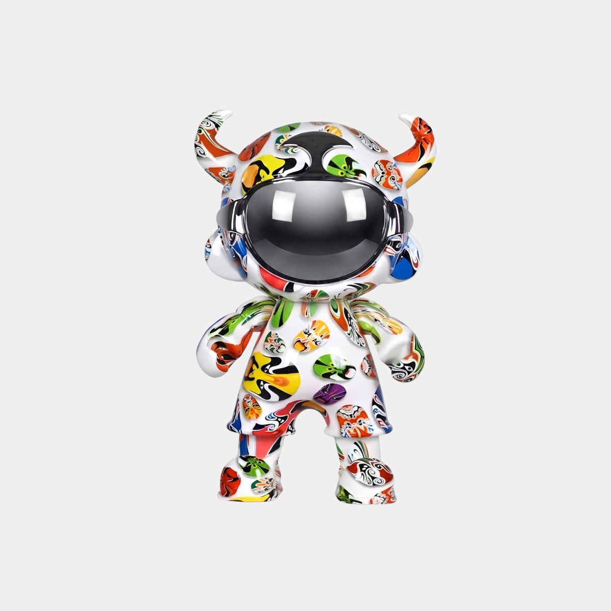 The Doodle Pop Astro Devil Figure - 35cm by Giant Sculptures is a glossy collectible featuring a horned humanoid with a chrome faceplate and vibrant abstract patterns on white.