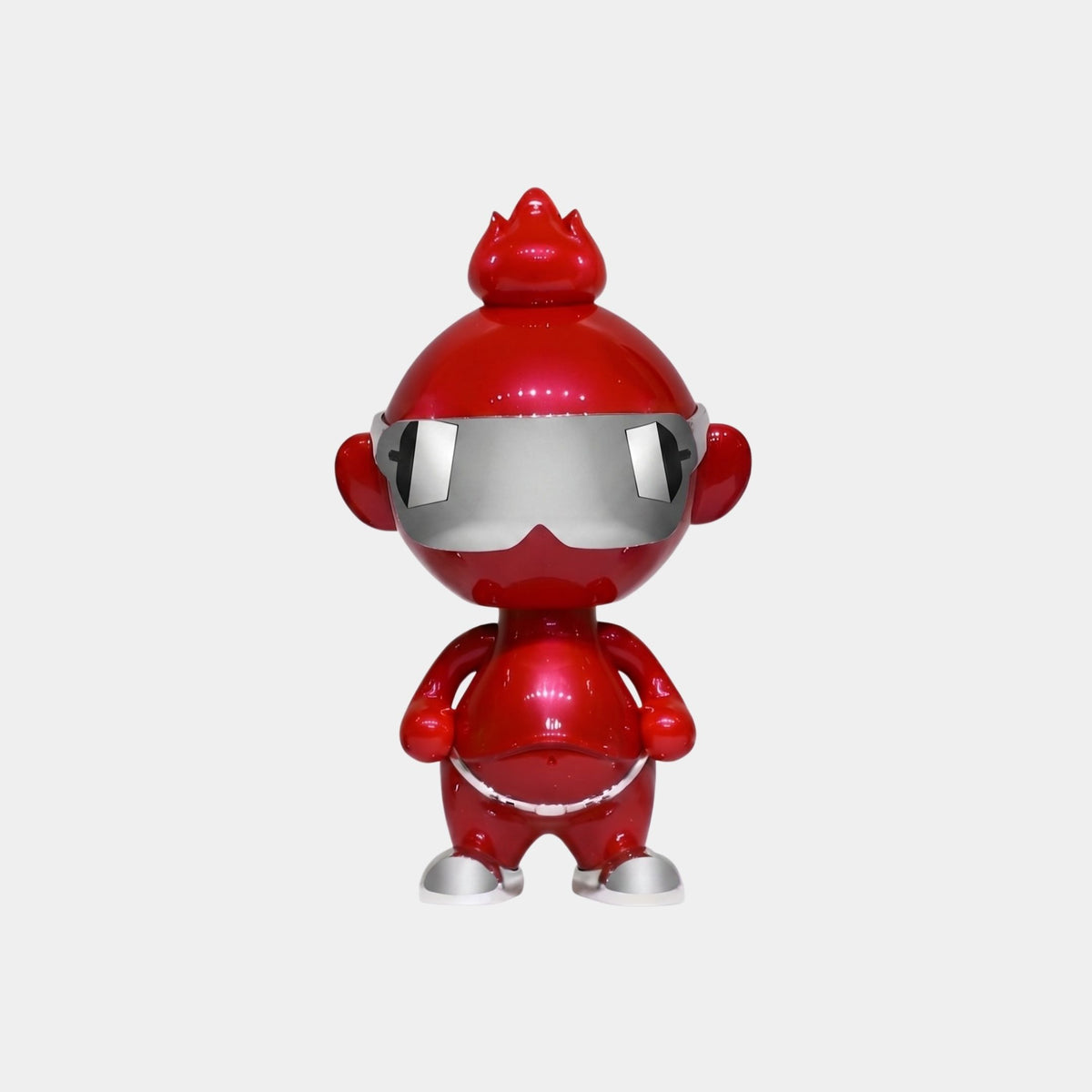 The Crimson Chrome Orbix Figure - 29cm by Giant Sculptures showcases a shiny red body, round head, pointy crown, chrome visor, and small limbs—a bold piece of modern character design on a plain white background.
