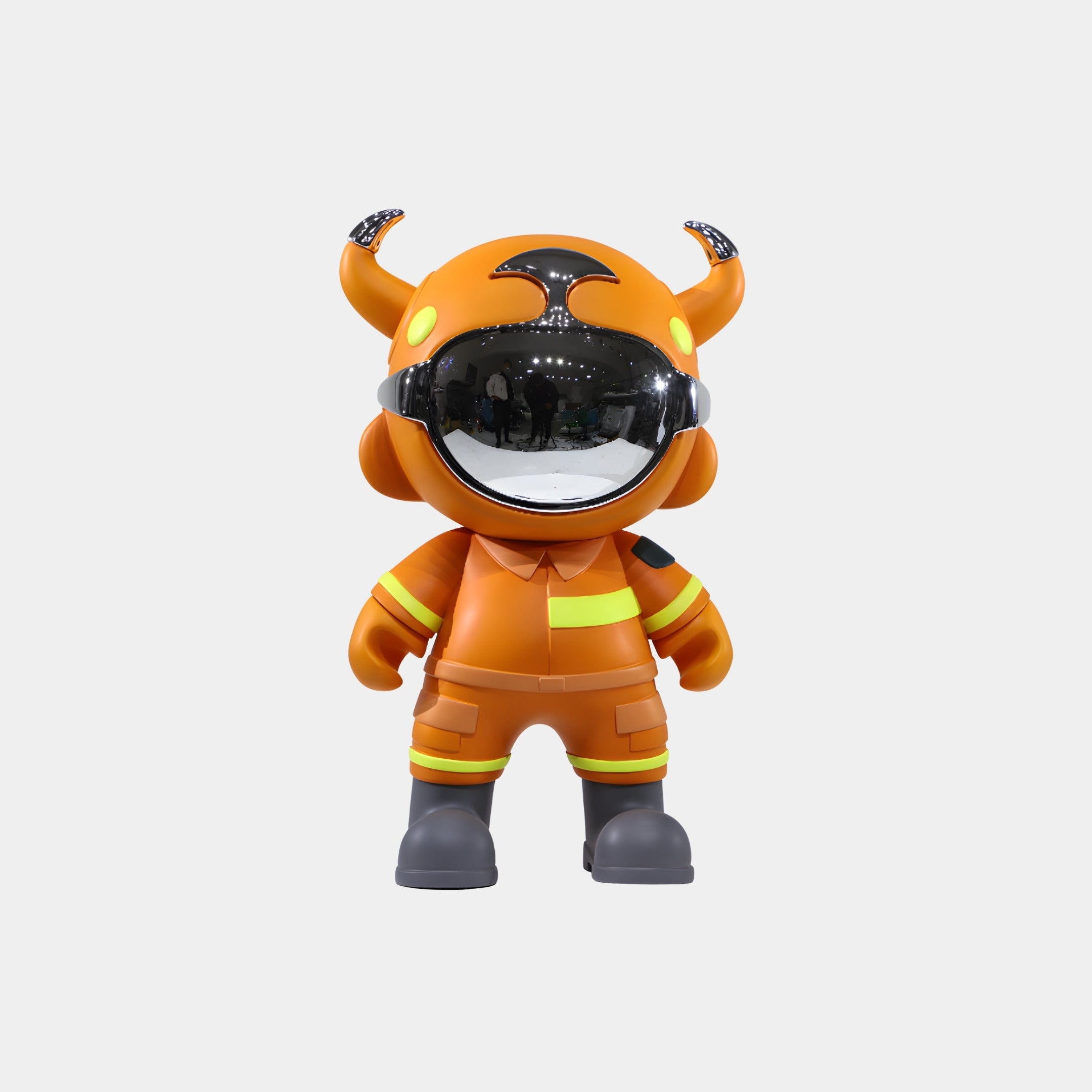 The Orange Utility Astro Devil Figure - 35cm by Giant Sculptures features firefighter-style clothing with yellow stripes, black boots, a shiny visor, horn-like helmet protrusions, and a bold cartoonish design.