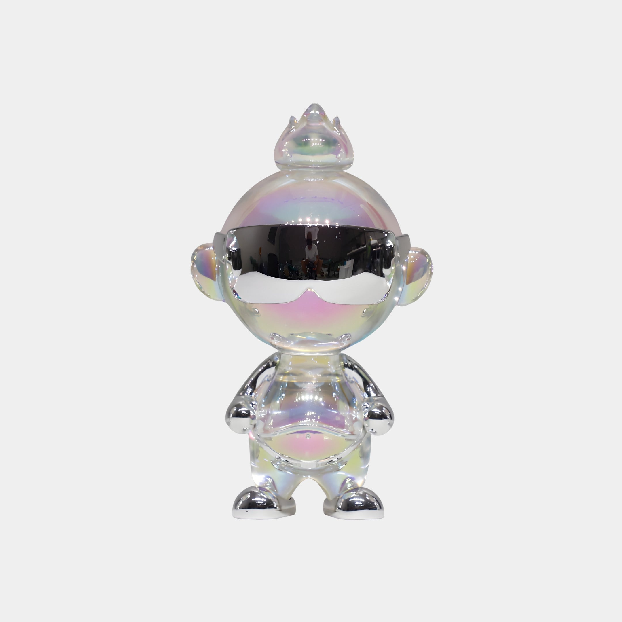 The Chrome Orbix Iridescent Glintz Figure - 19cm by Giant Sculptures features a round head, chrome visor sunglasses, small crown, and a reflective silver finish—an eye-catching 3D-printed resin sculpture against a white background.