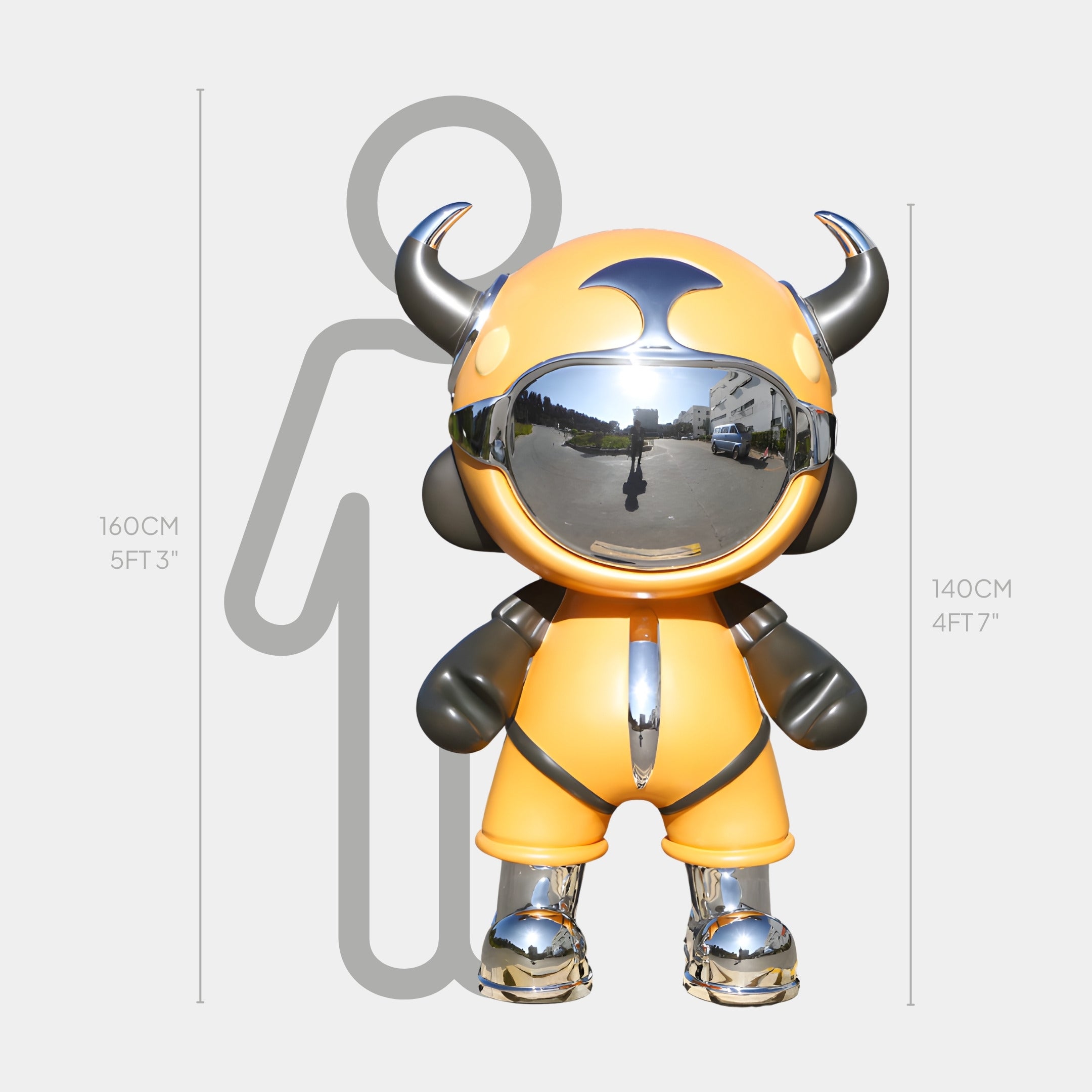 The Giant Sculptures Yellow Chrome Suit Astro Devil Sculpture - 140cm, a large, shiny, cartoon-like fiberglass piece, stands next to a height chart with a gray figure behind it measuring 160 cm tall.
