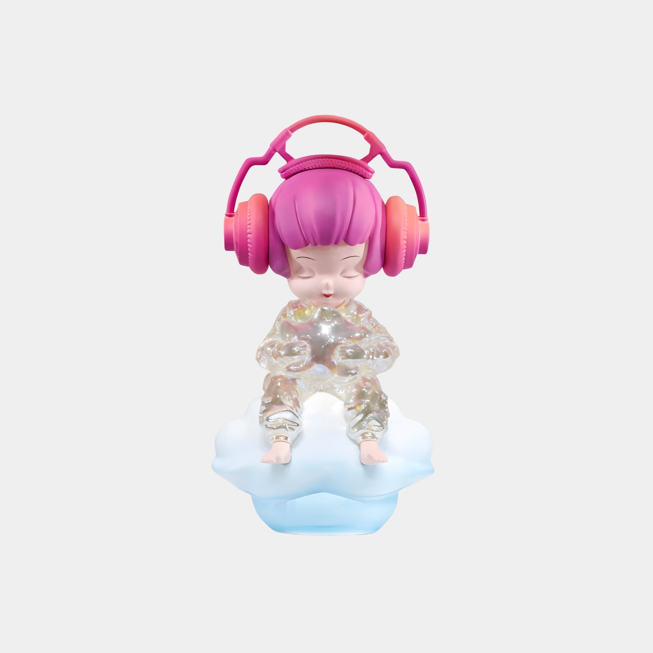 The Pink Headphones Cloud Dreamer Figure by Giant Sculptures is a 35cm iridescent art toy, featuring pink hair and headphones, sitting cross-legged on a glowing blue cloud and holding a silver star—a dreamy 3D-printed resin sculpture.