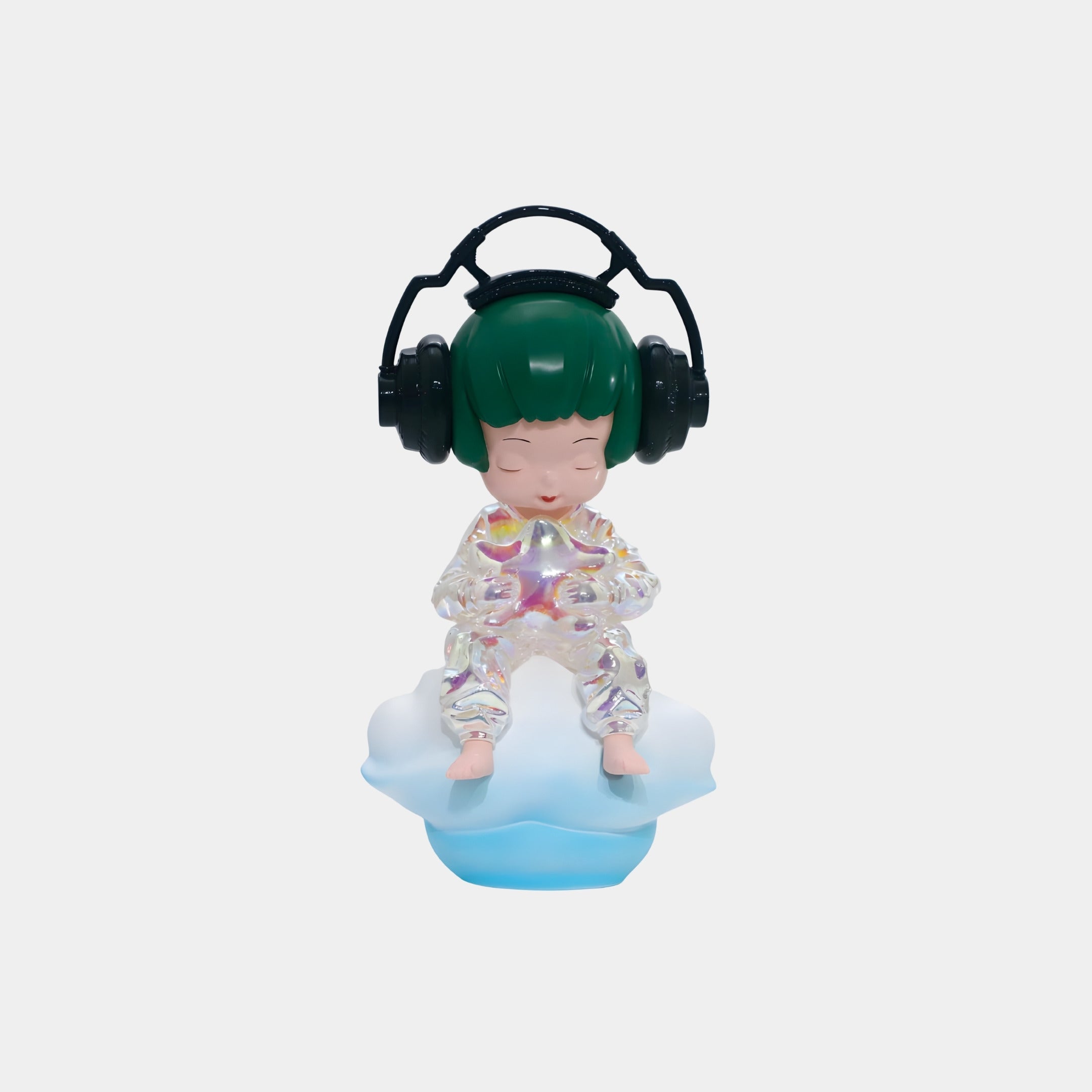 The Giant Sculptures Emerald Headphones Cloud Dreamer Figure (35cm) sits cross-legged on a blue and white cloud, sporting an iridescent outfit and holding a star—a charming 3D-printed resin piece for any decor.