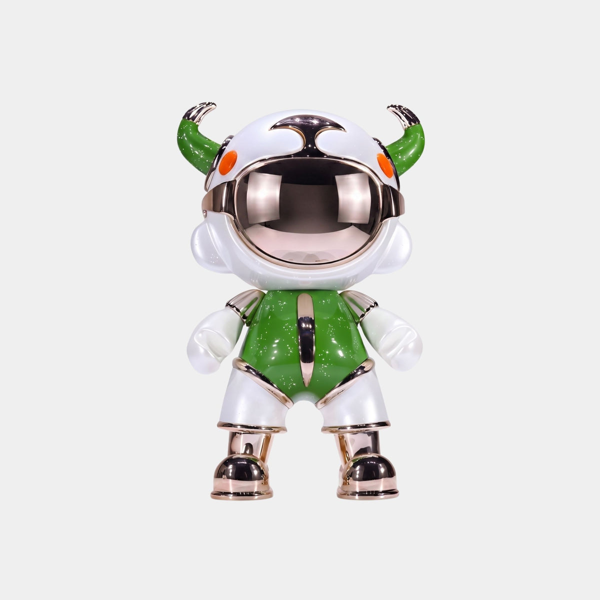 The Giant Sculptures Green & White Suit Astro Devil Figure (31cm) is a collectible sculpture with a metallic helmet, horn-like protrusions, orange eyes, and metallic accents, crafted from eco-friendly resin.