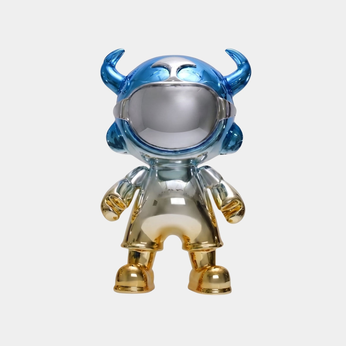 The Giant Sculptures Blue & Gold Astro Devil Figure - 80cm features a mirror-finish metallic astronaut with blue horns, a blue helmet, and a reflective visor in silver, gold, and blue tones on a plain white background.