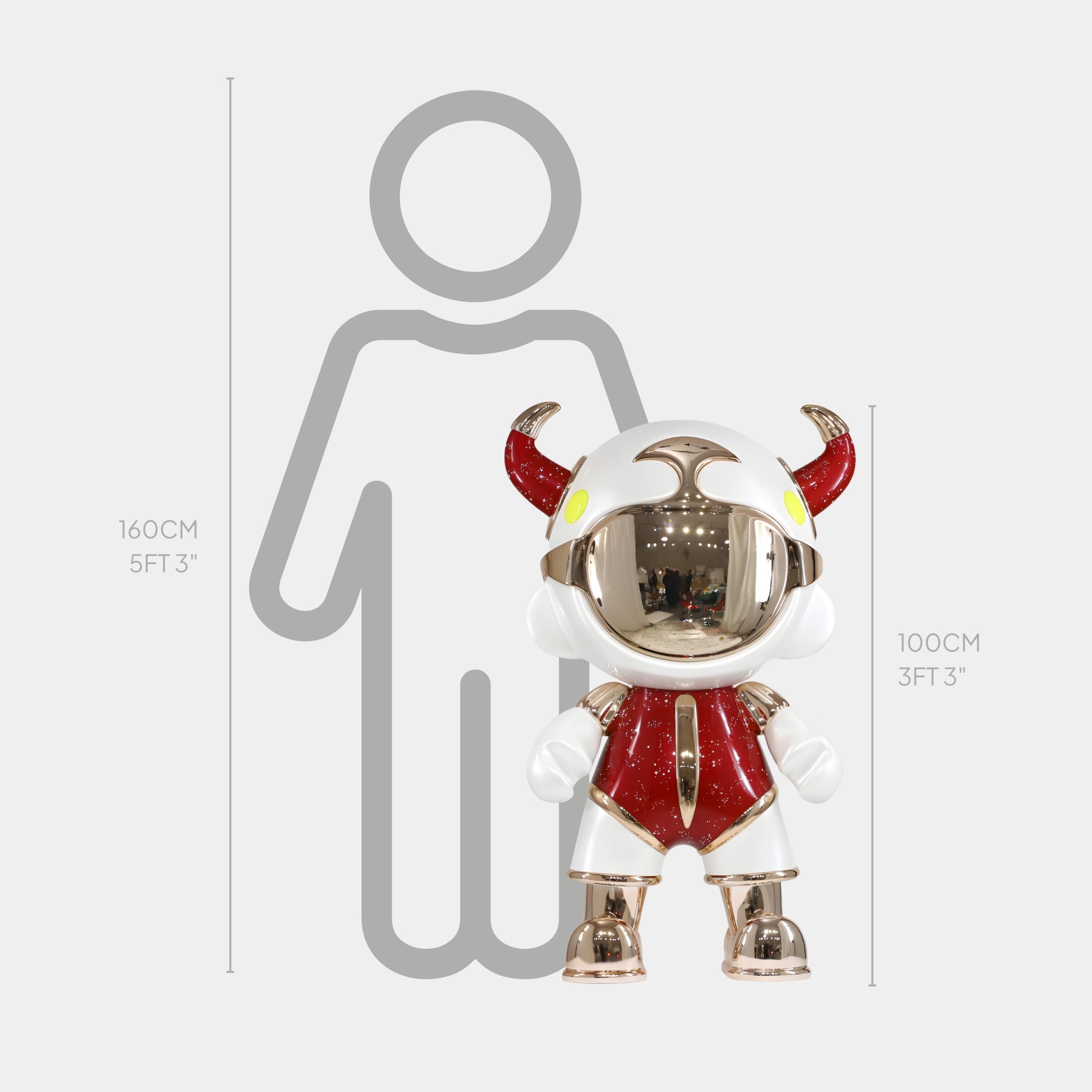 The Giant Sculptures Red & White Suit Astro Devil Sculpture stands 100cm (3ft 3in) tall, shown before a gray outline of a 160cm (5ft 3in) person for scale. The fiberglass piece features red horns and gold accents.